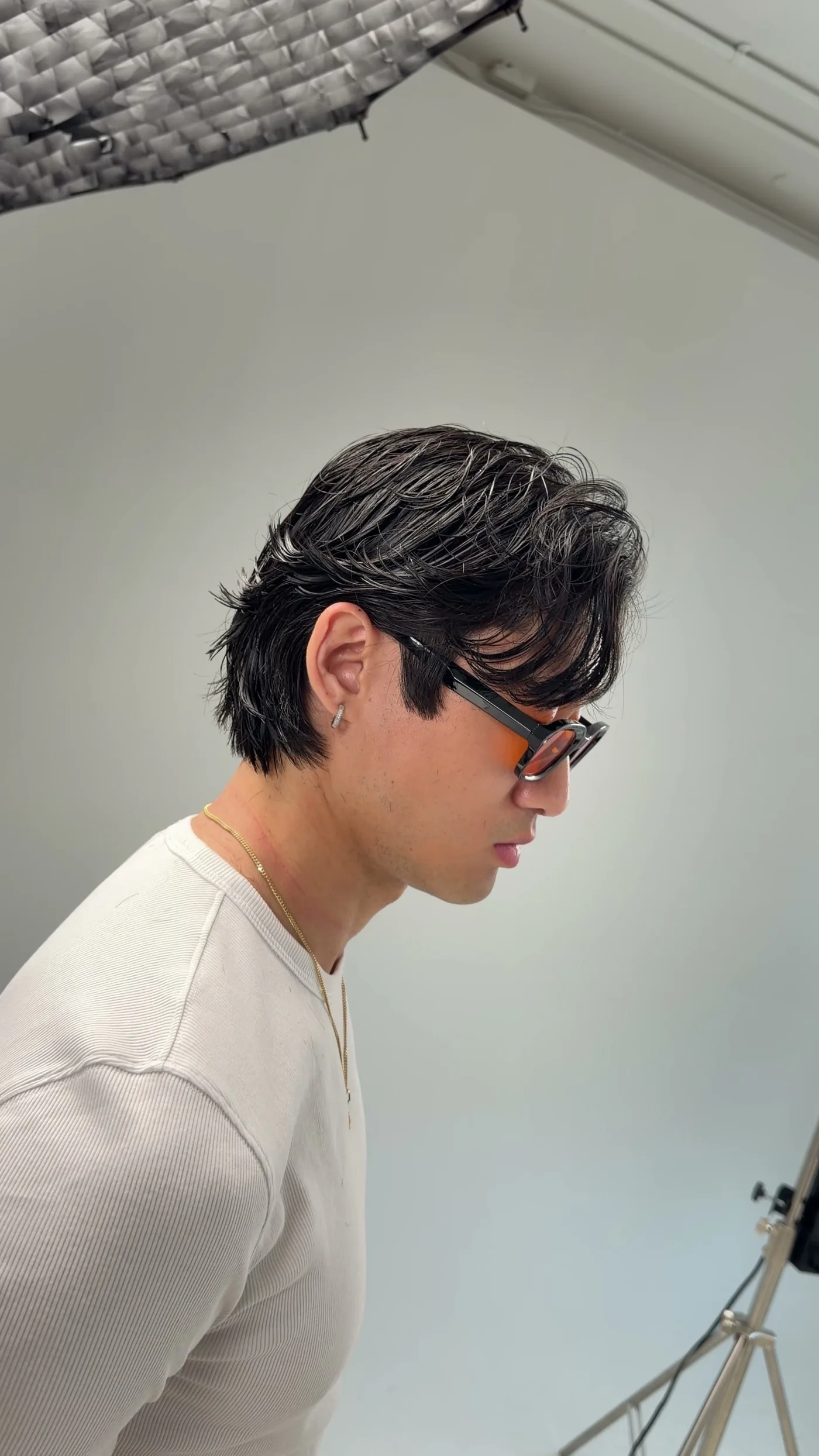Textured cut with sunglasses, profile